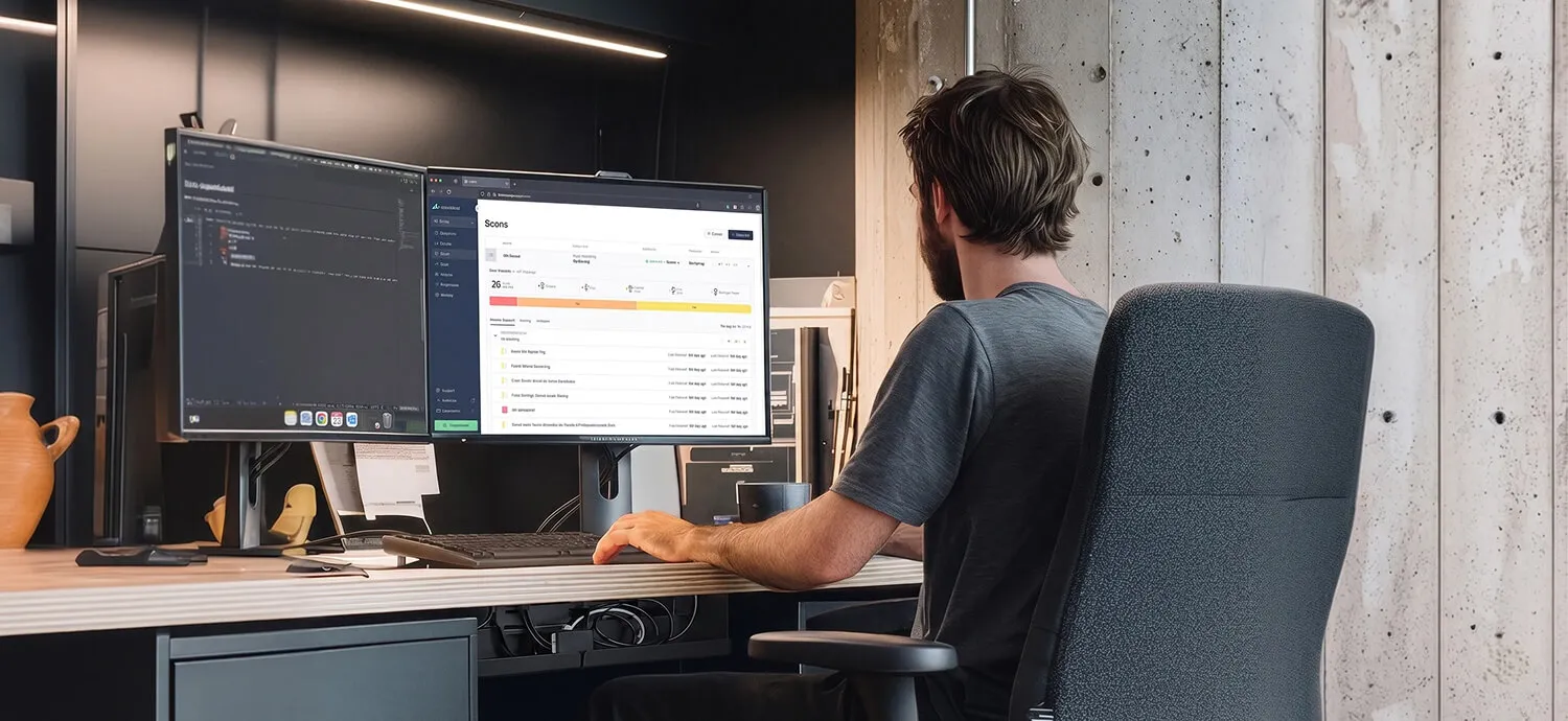 Security team reviewing scan results on their monitors
